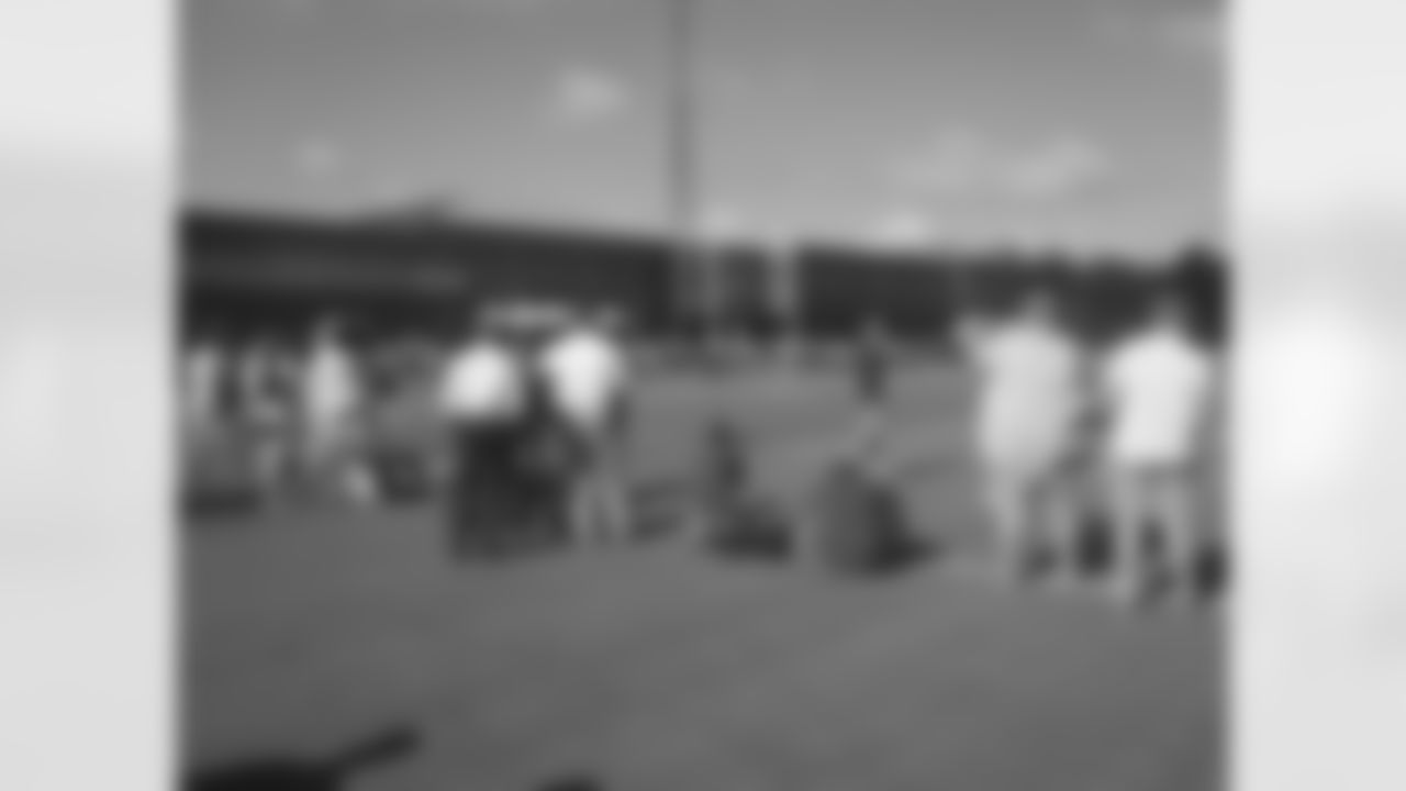 The media gathers during the first practice of 2011 Russell Athletic Training Camp // Jay's Day: Vol. 1 // July 29, 2011 // Flowery Branch, Ga. —
