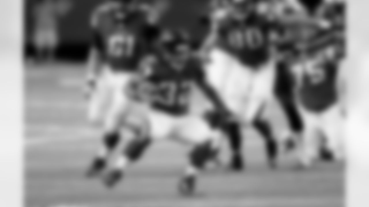 RB Jaquizz Rodgers runs the ball during the first half of play.