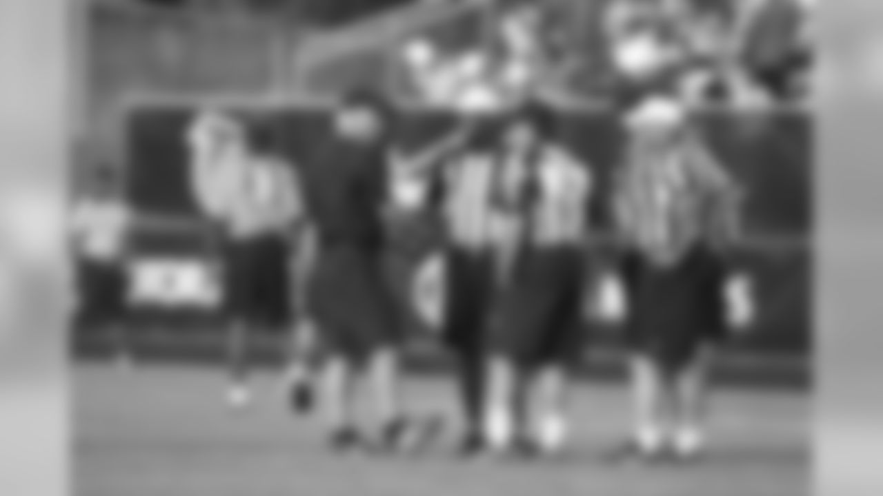 Mike Smith meets with the officiating crew prior to practice // 2011 Friday Night Lights // August 5, 2011 // Norcross, Ga. —