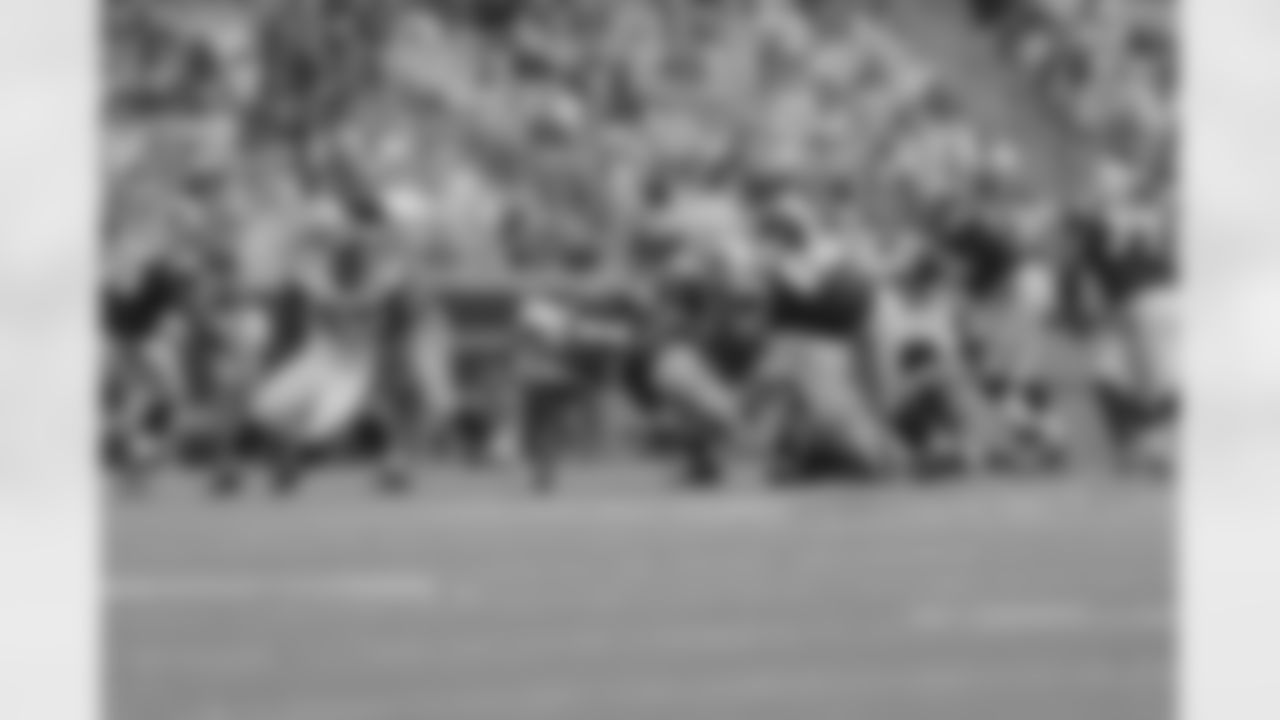 DE Kroy Biermann and DT Jonathan Babineaux sack Panthers QB Cam Newton