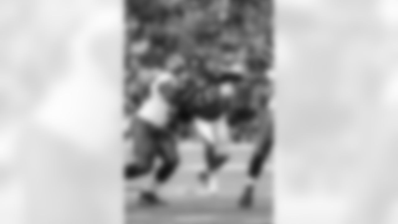 S Thomas DeCoud works to break free