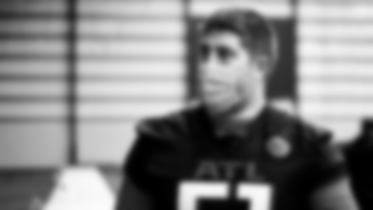 Atlanta Falcons center Alex Mack #51 looks on during practice in the indoor facility at IBM Performance Field.