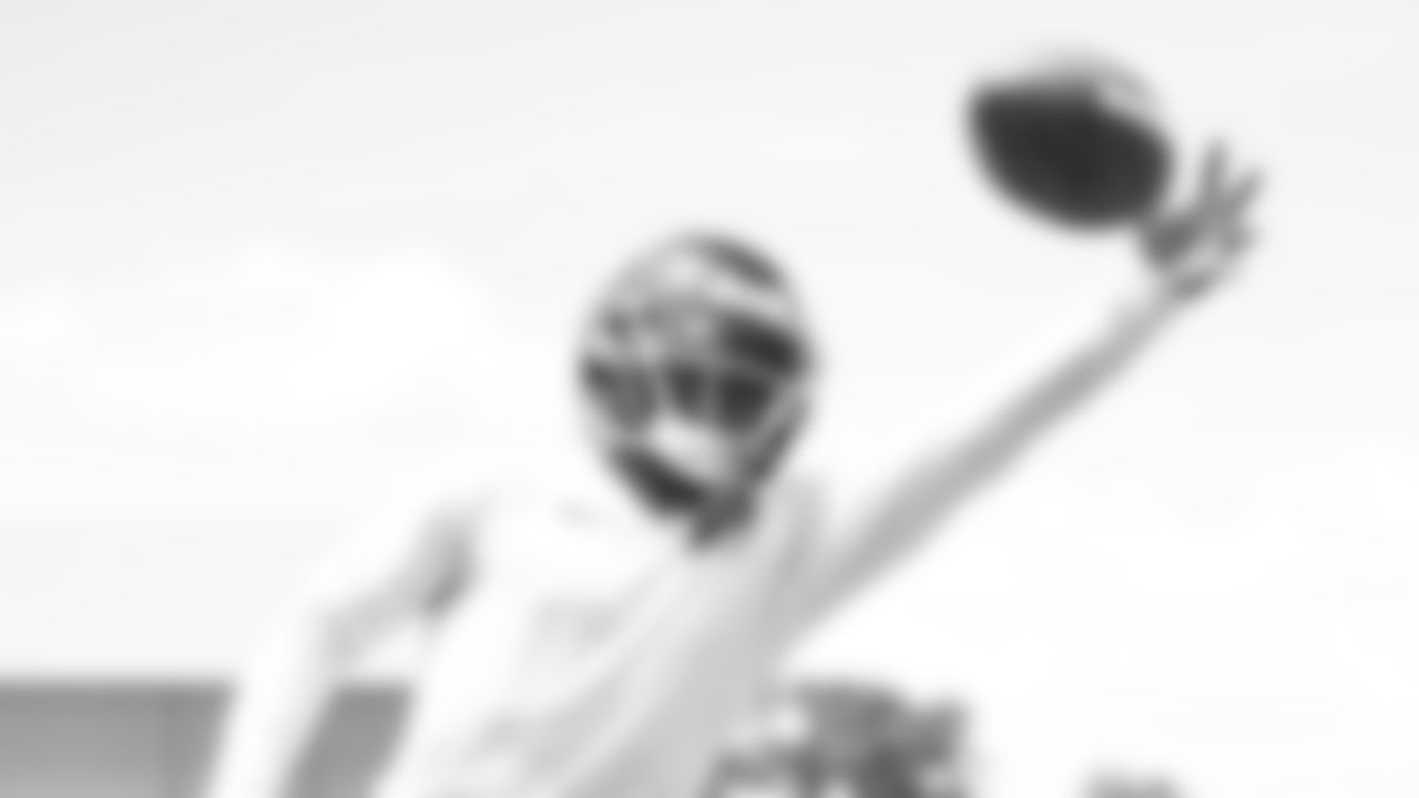 Atlanta Falcons wide receiver Greg Dortch #16 makes a catch during organized team activities in Phase III of the Atlanta Falcons offseason program on June 4, 2021.