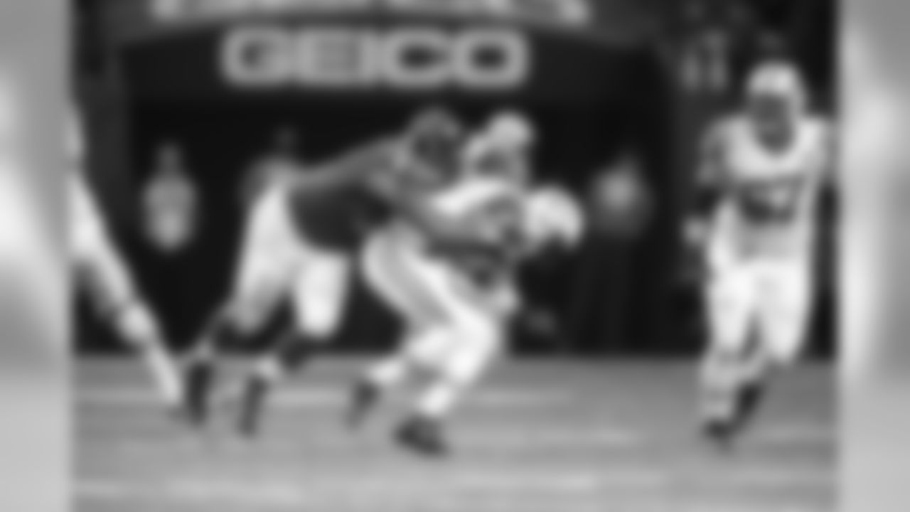 DT Corey Peters sacks QB Geno Smith