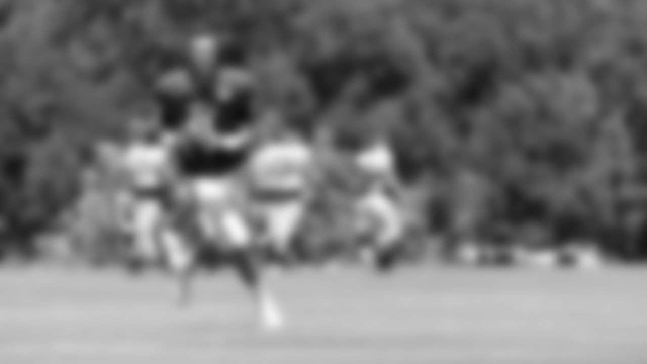 Atlanta Falcons quarterback Matt Ryan #2 runs with the ball during AT&T Atlanta Falcons Training Camp at Atlanta Falcons Headquarters in Flowery Branch, Georgia, on Thursday August 26, 2021. (Photo by Dakota Williams/Atlanta Falcons)