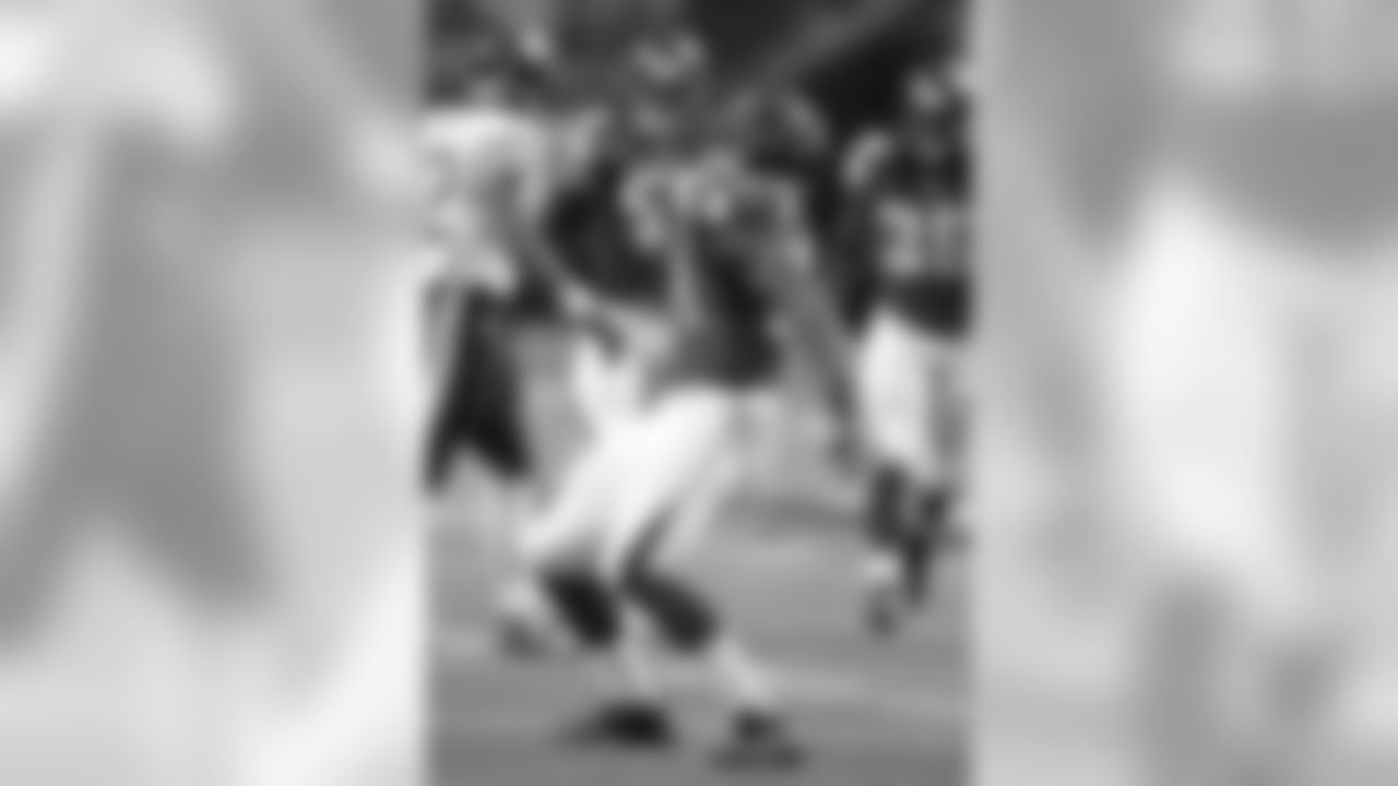 DE Jonathan Massaquoi celebrates a play