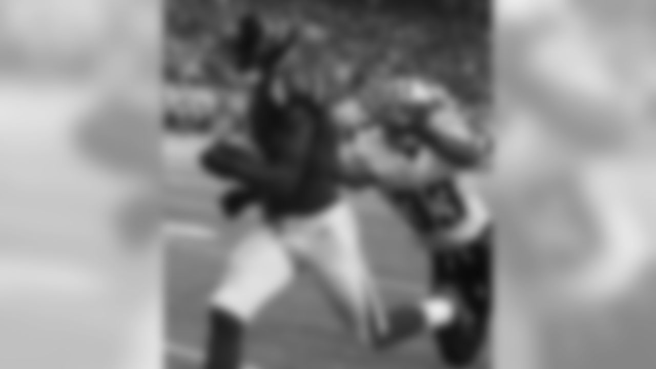 WR Julio Jones slides past Titans S Michael Griffin for a touchdown