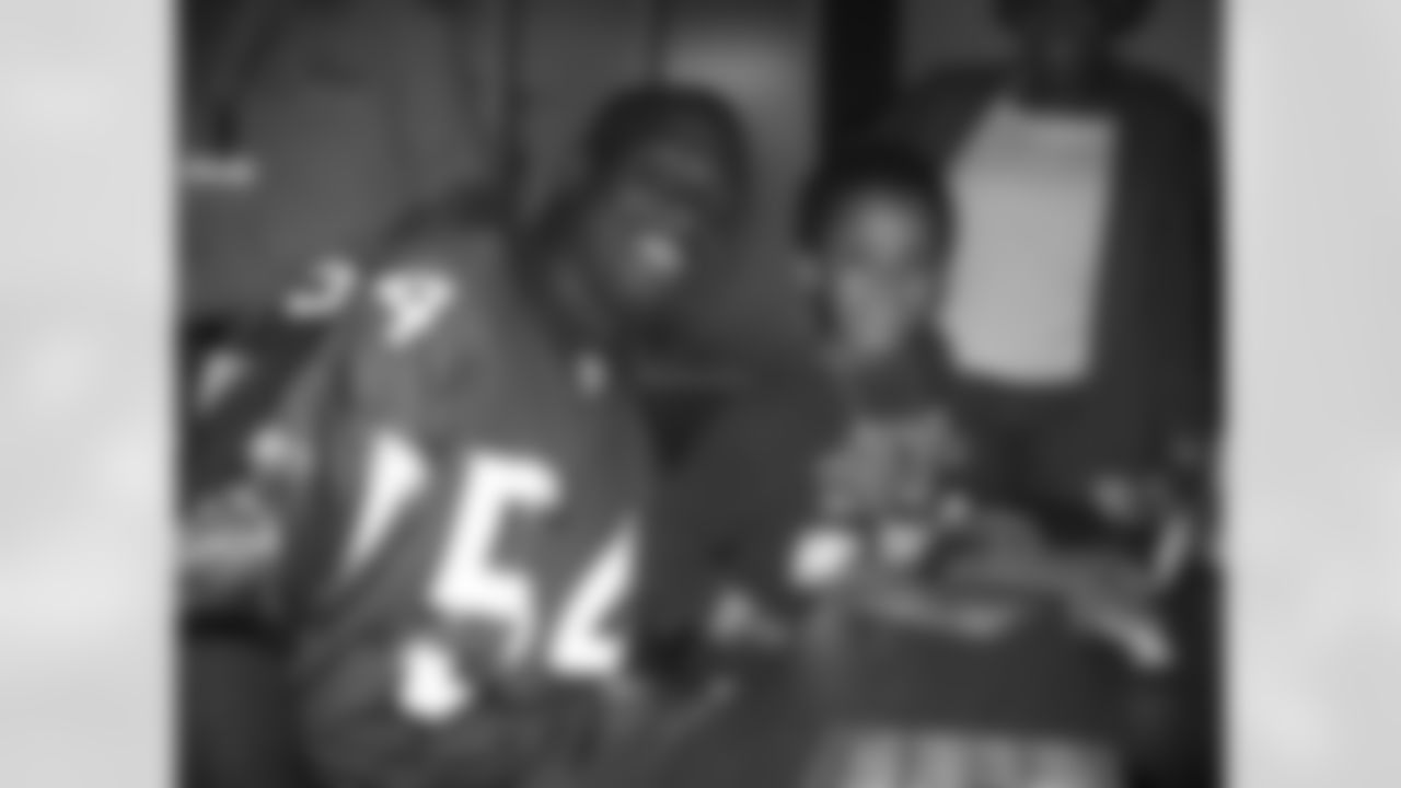 The Atlanta Facons visit Children's Healthcare of Atlanta // Atlanta, GA // Stephen Nicholas with a patient //