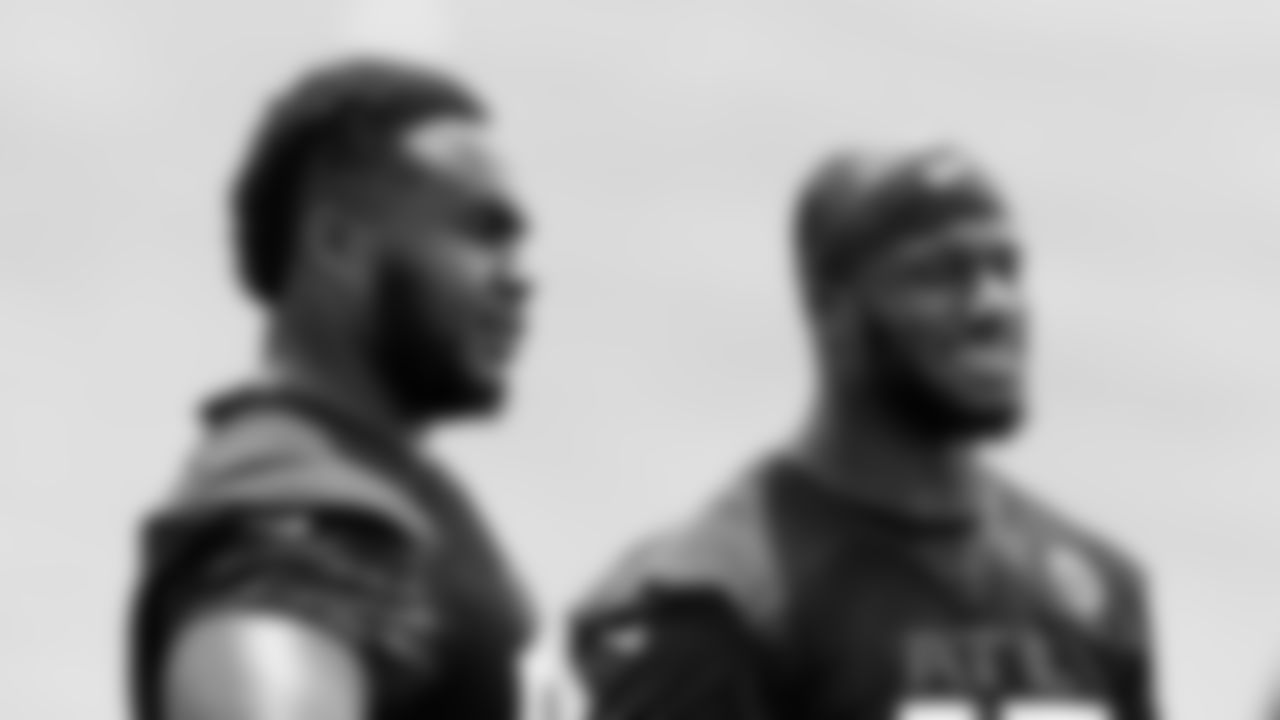 Atlanta Falcons linebacker Deion Jones #45 looks on with defensive tackle Grady Jarrett #97 during organized team activities in Phase III of the Atlanta Falcons offseason program on May 26, 2021.