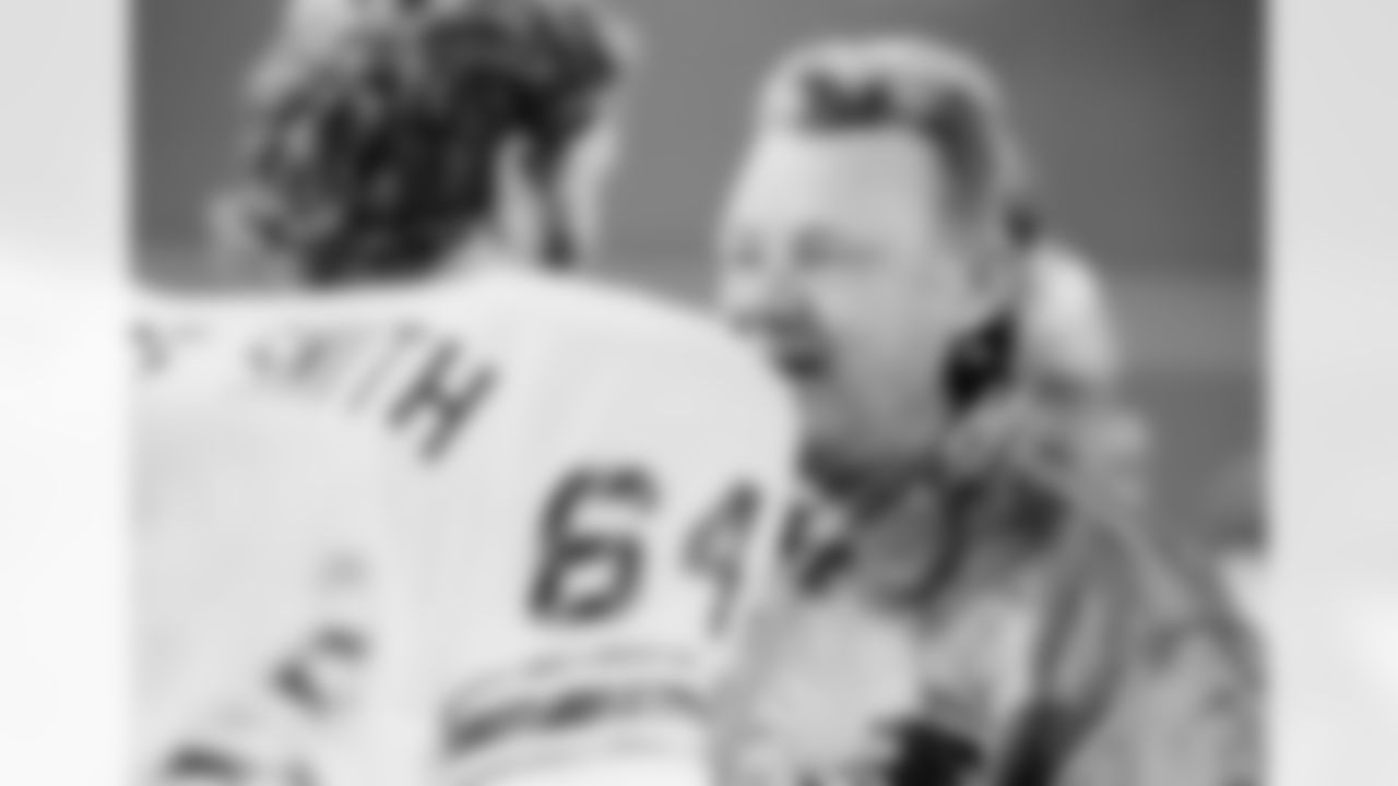 Falcons head coach Norm Van Brocklin, right, talks with guard Royce Smith before sending him to the huddle during third quarter action with the Pittsburgh Steelers in Pittsburgh on Oct. 29, 1974