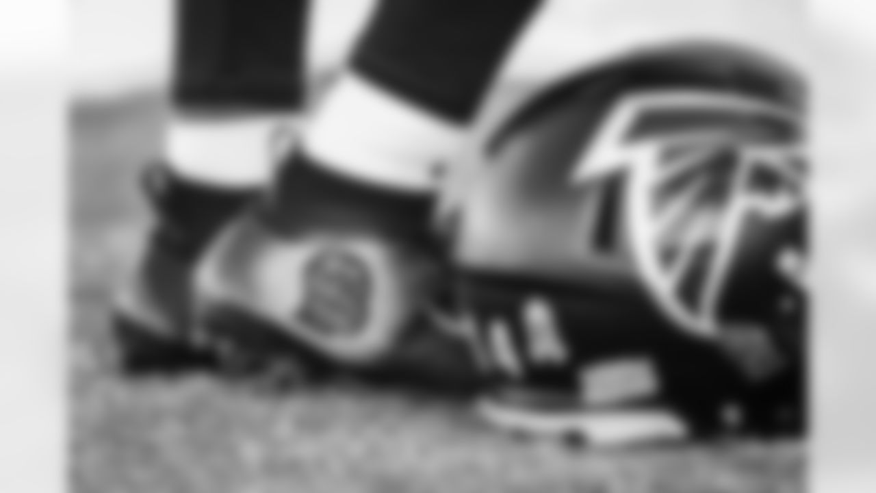 View of cleats worn by Atlanta Falcons running back Cordarrelle Patterson #84 during team practice at Atlanta Falcons Headquarters in Flowery Branch, Georgia, on Thursday, December 2, 2021. (Photo by Shanna Lockwood/Atlanta Falcons)