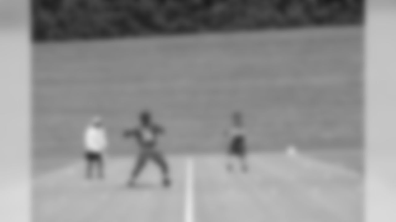 From left: RB Coach Gerald Brown, QB Dominique Davis, RB Robbie Frey // 2012 Rookie Minicamp – Day 1 // May 11, 2012 // Flowery Branch –