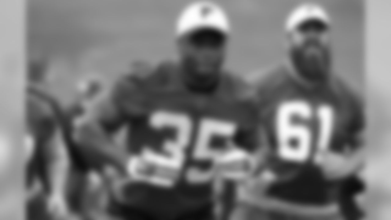 RB Antone Smith and C Joe Hawley
