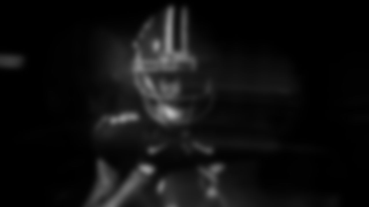 AJ Terrell poses for a portrait during the Red Helmet shoot at Mercedes-Benz Stadium in Atlanta, Georgia on Friday, May 17, 2022. (Photo by Brandon Magnus/Atlanta Falcons)