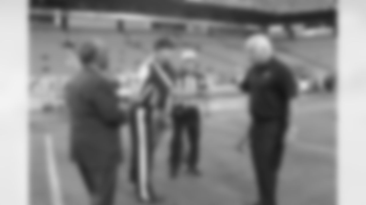 Head Coach Mike Smith shakes hands with the referees // Falcons at Dolphins - 2012