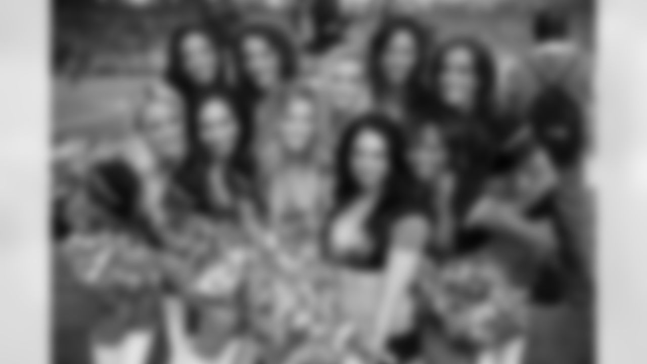 A few of the Atlanta Falcons Cheerleaders gather around for a picture