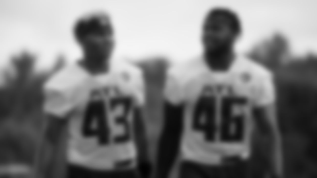 Atlanta Falcons linebacker Mykal Walker #43 walks with linebacker Edmond Robinson #46 at AT&T Atlanta Falcons Training camp on August 15, 2020 in Flowery Branch, Ga. (Photo by Kara Durrette/Atlanta Falcons)