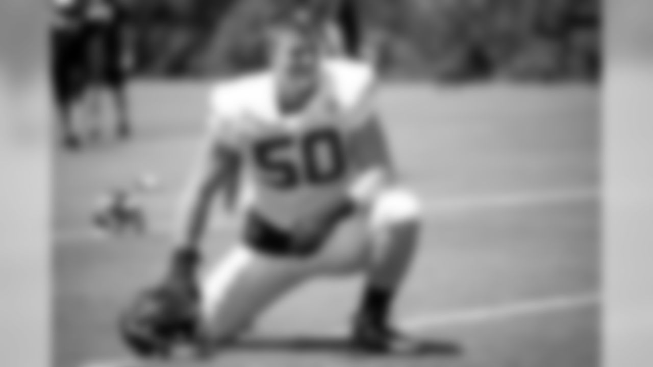 Atlanta Falcons defensive end John Cominsky #50 stretches during practice. (Photo by Kara Durrette/Atlanta Falcons).