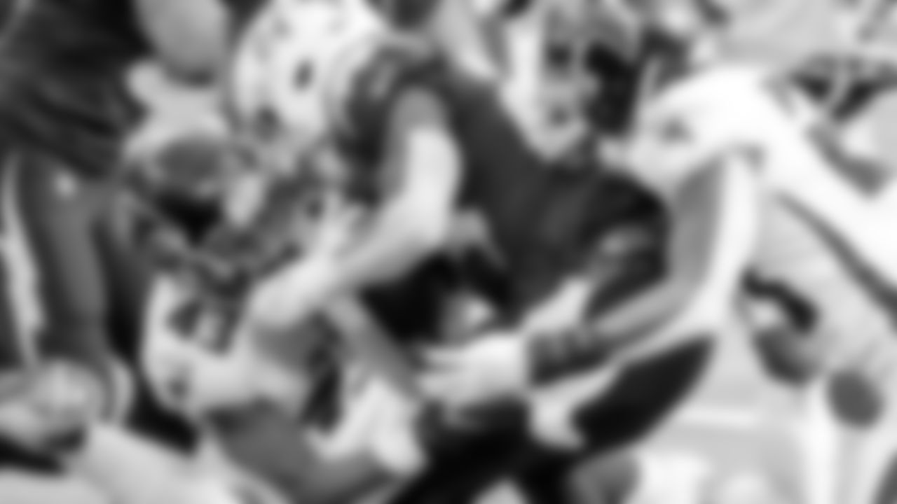 Atlanta Falcons linebacker Mykal Walker #43 tackles Los Angeles Chargers free safety Nasir Adderley #24 during the game on December 13, 2020.