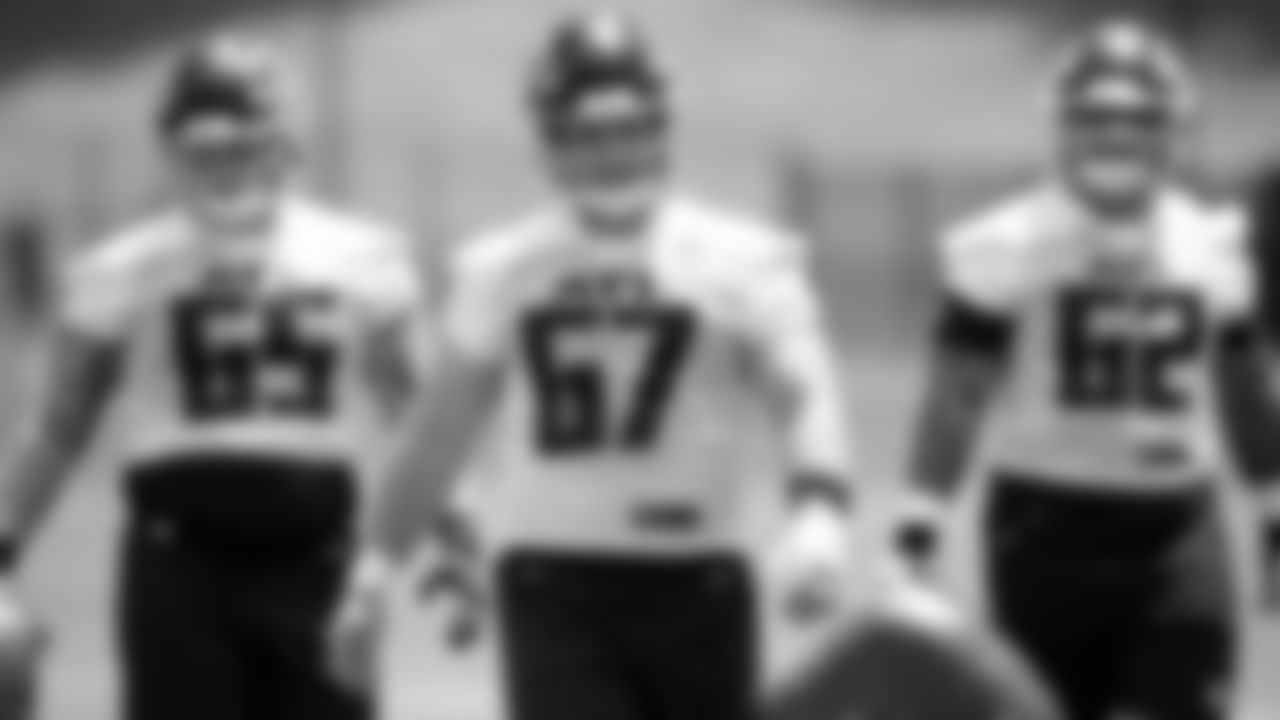 Atlanta Falcons offensive lineman Drew Dalman #67 looks on during the first practice of Atlanta Falcons rookie minicamp on May 14, 2021.