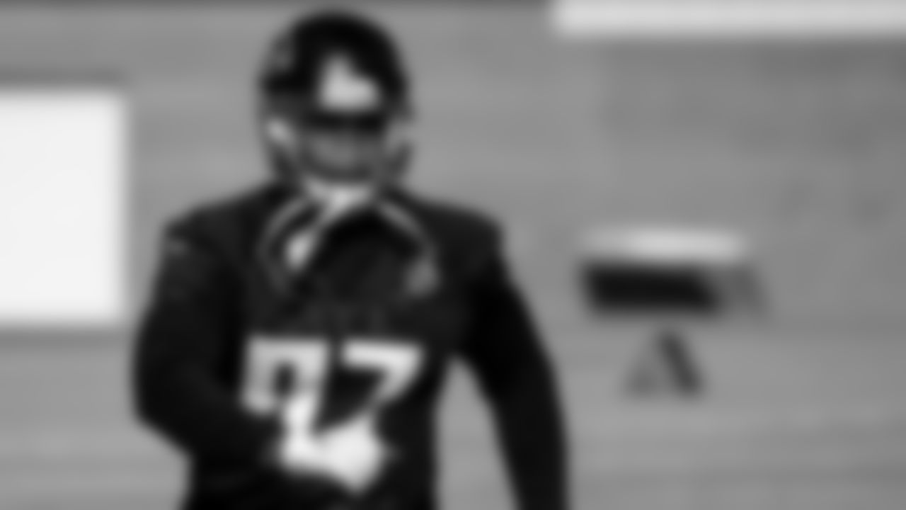 Atlanta Falcons defensive tackle Grady Jarrett #97 warms up during practice at IBM Performance Field.
