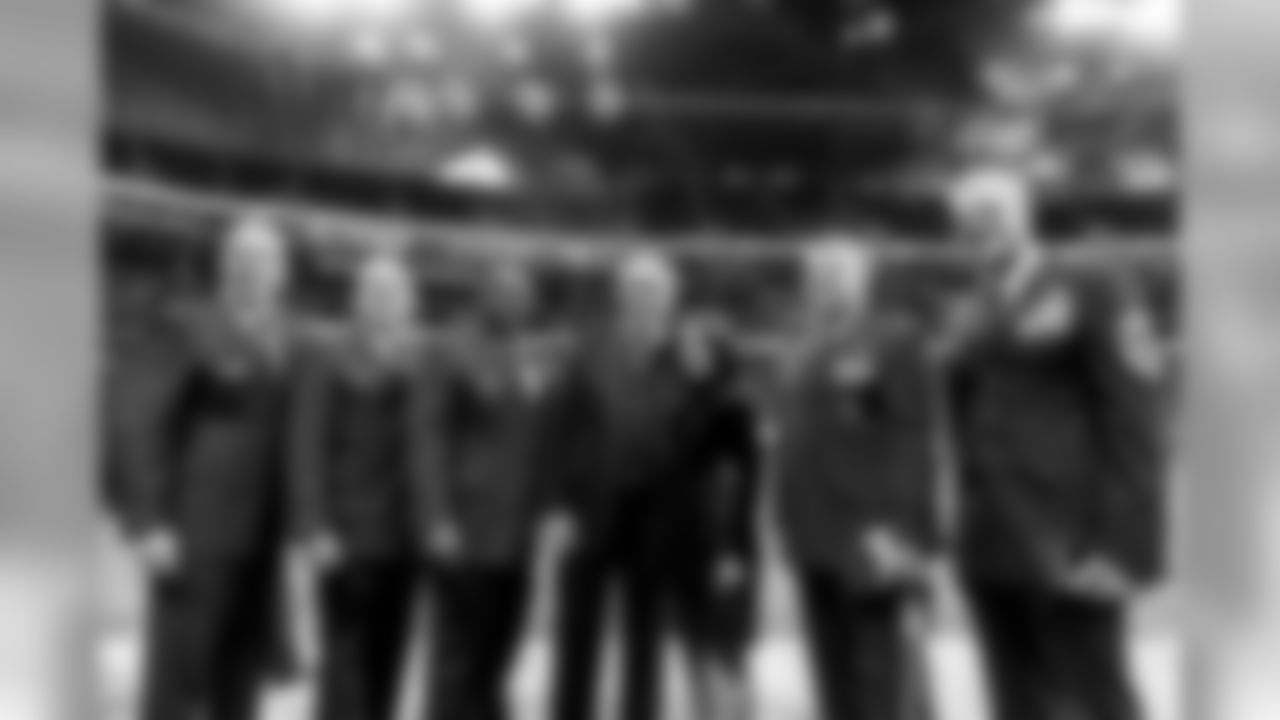 Atlanta Falcons Arthur M Blank poses for a photo with members of the military before the game between the Atlanta Falcons and the Tampa Bay Buccaneers at Mercedes-Benz Stadium in Atlanta, GA, on Sunday November 24, 2019. (Photo by Jacob Gonzalez/Atlanta Falcons)
