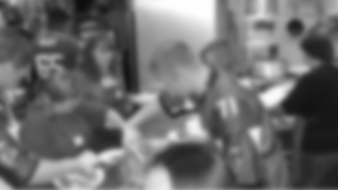 The Atlanta Falcons Rookie Club and Kroy Biermann served Thanksgiving Lunch