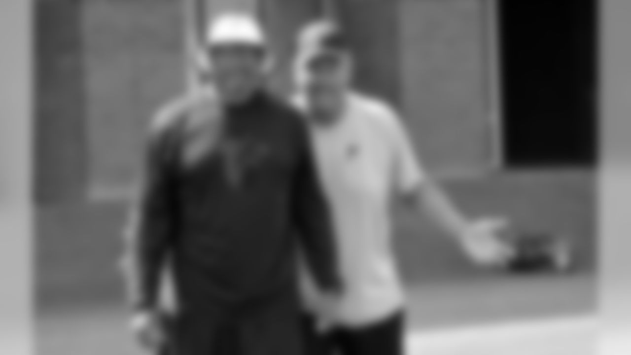 Wide Receivers coach Terry Robiskie and secondary coach Tim Lewis