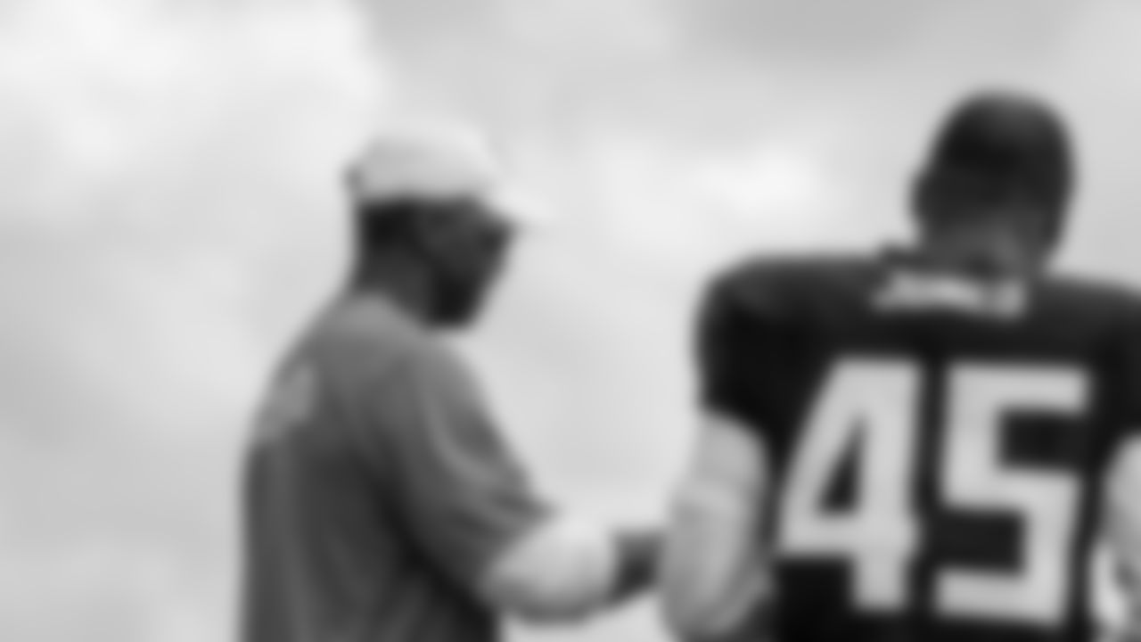 Linebackers coach Frank Bush works with linebacker Deion Jones #45 during AT&T Atlanta Falcons Training Camp at Atlanta Falcons Headquarters in Flowery Branch, Georgia, on Thursday August 5, 2021. (Photo by Kara Durrette/Atlanta Falcons)