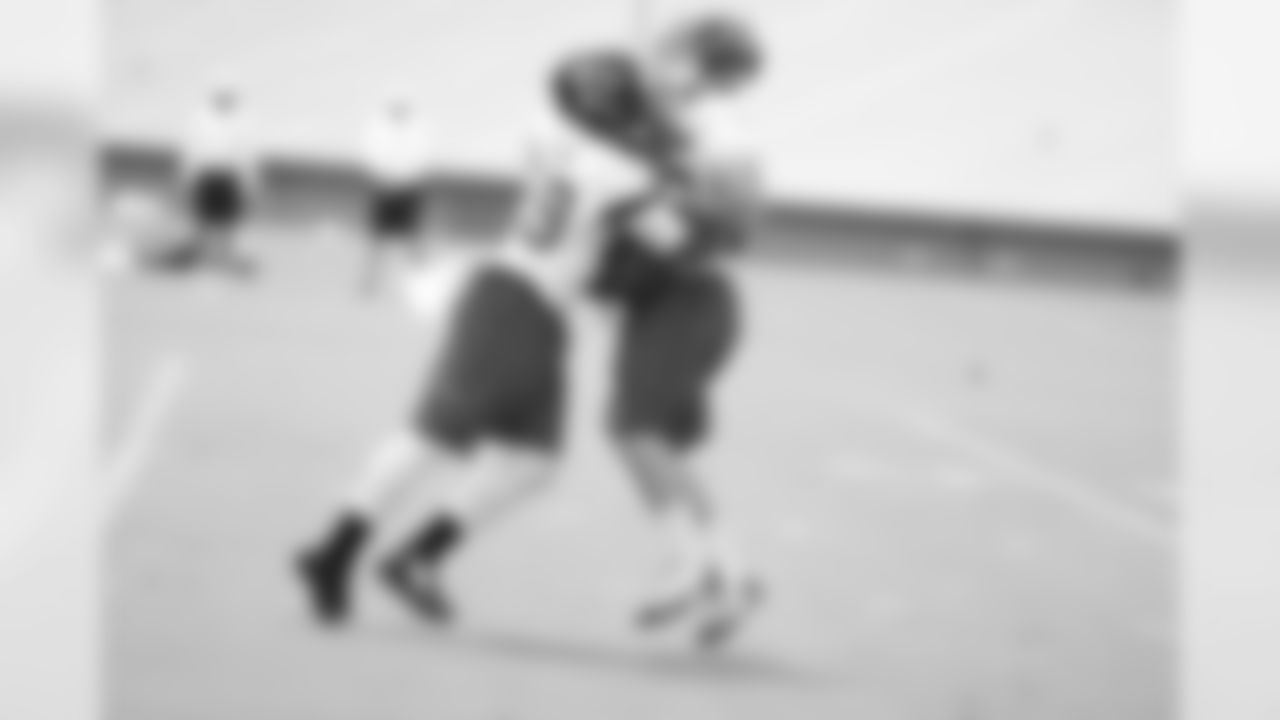 LB Joplo Bartu and LB Paul Worrilow