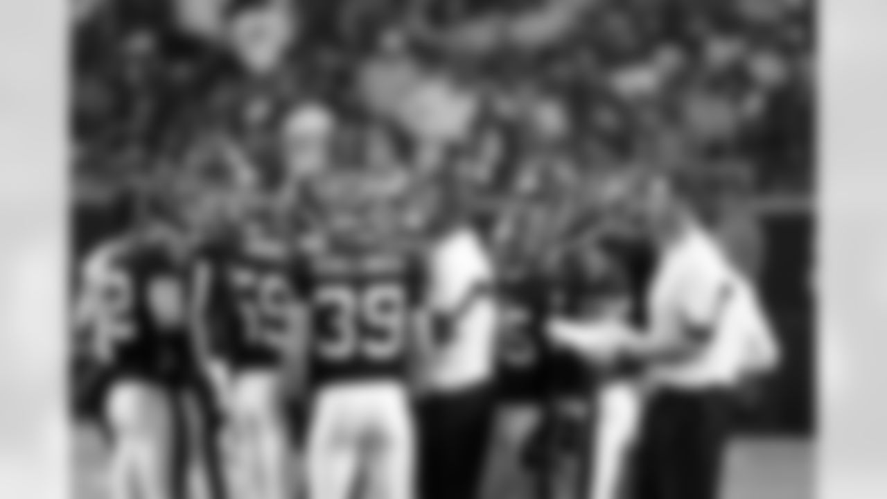 Falcons special teams rally around Coach Armstrong before kickoff. // Falcons vs Ravens // 11/11/10 - Georgia Dome