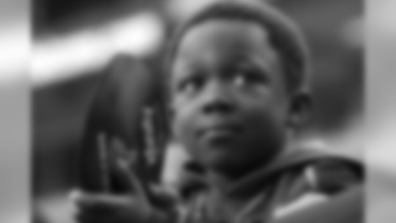 A young Falcons fan waits in excitement for the game to begin // Falcons vs Buccaneers // 11/7/10 - Georgia Dome