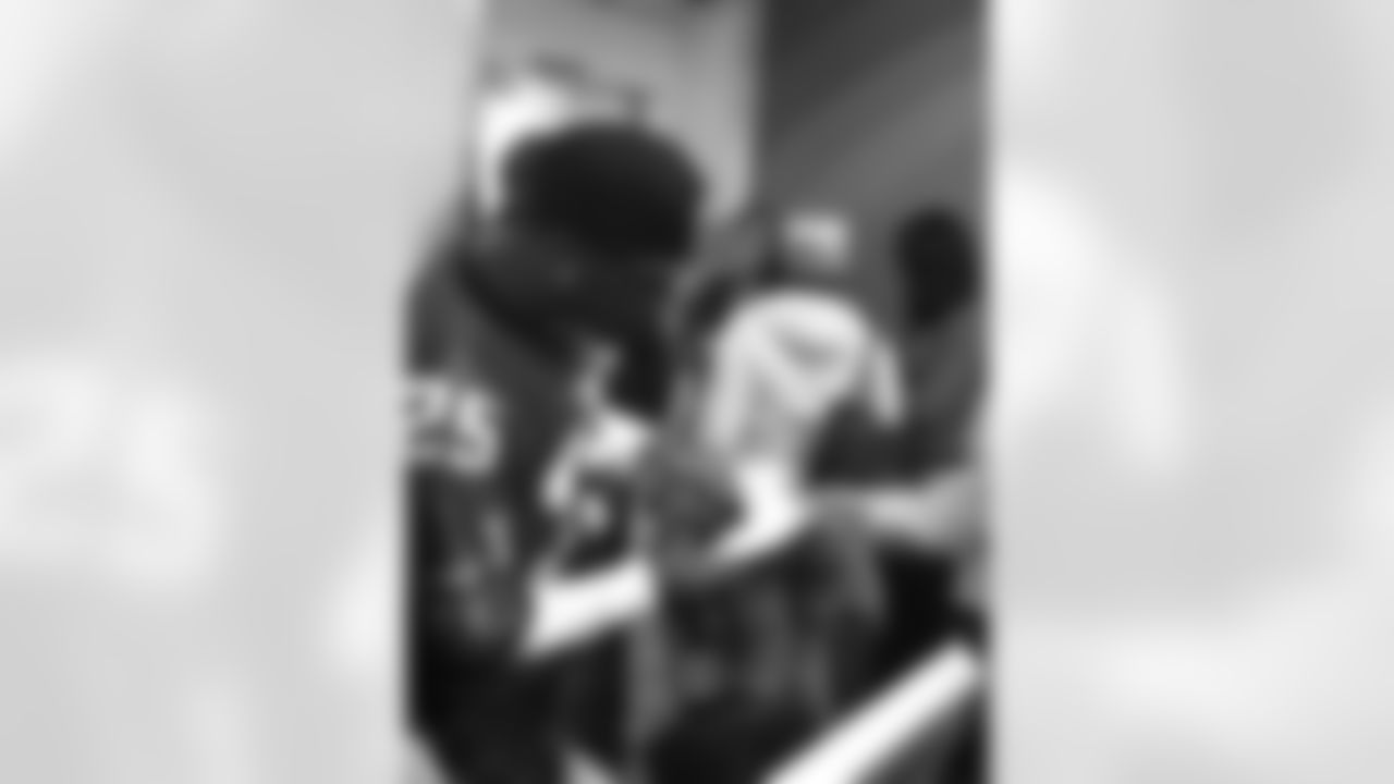 William Moore scans a ticket as passengers board an AirTran flight // Trading Places - AirTran // Nov. 1, 2011 // Atlanta -