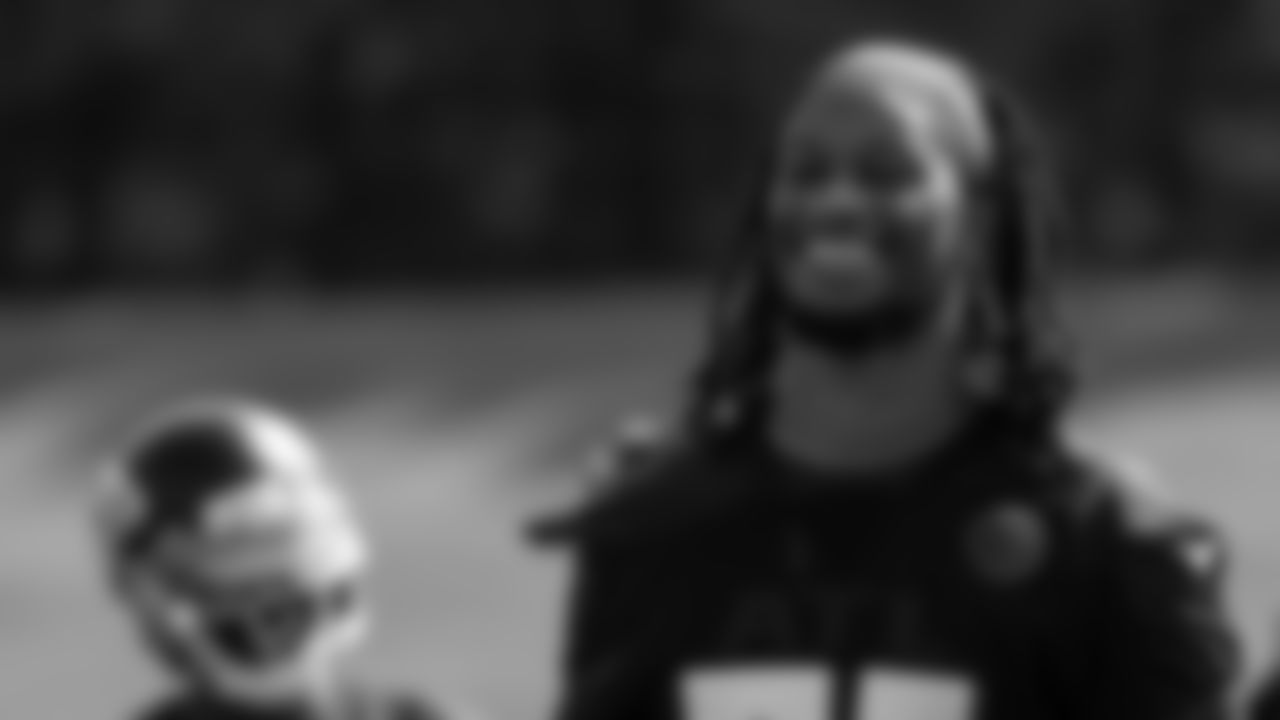 Atlanta Falcons running back Todd Gurley II #21 smiles at AT&T Atlanta Falcons Training Camp on August 23, 2020 in Flowery Branch, GA. (Photo by Kara Durrette/Atlanta Falcons)