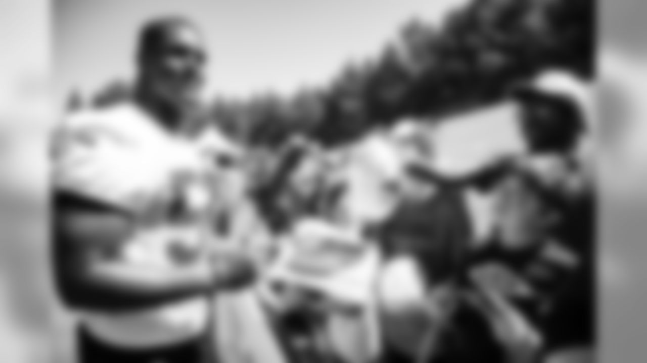 July 24, 2019 - LB Yurik Bethune signs autographs for fans on the third day of practice. (Photo by Kara Durrette/Atlanta Falcons)