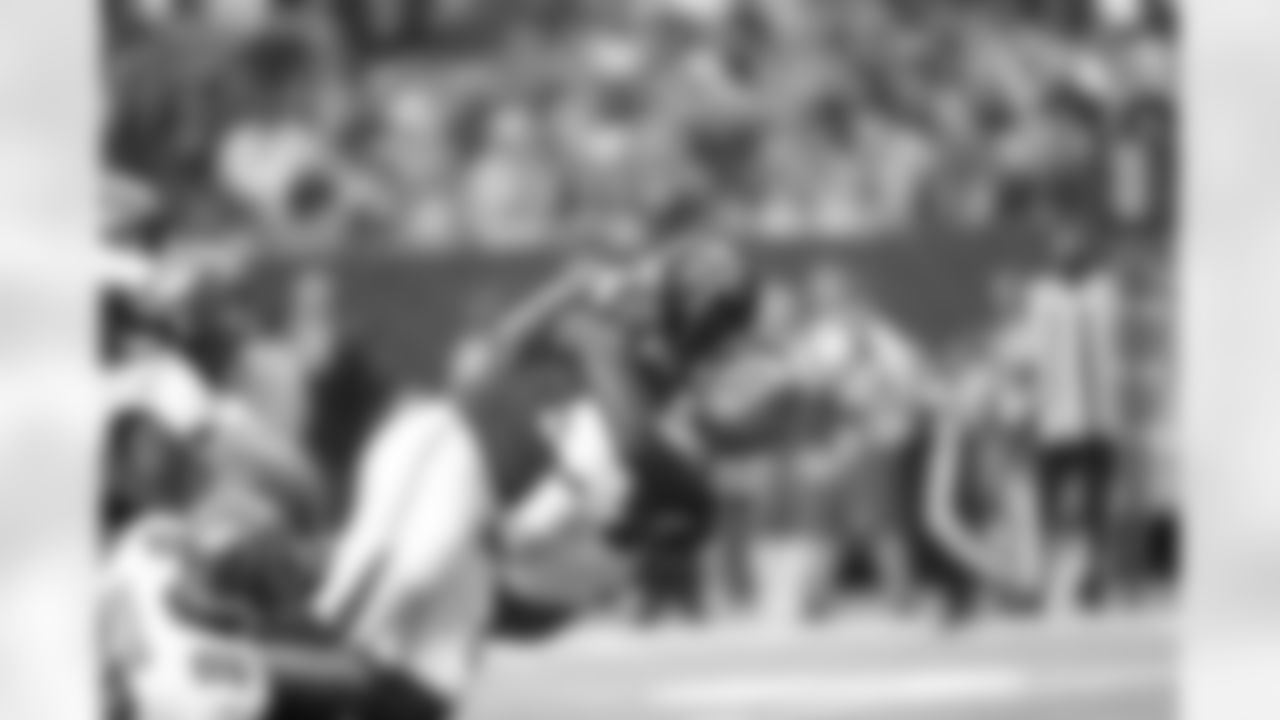 Buccaneers QB Mike Glennon is taken down by DE Malliciah Goodman