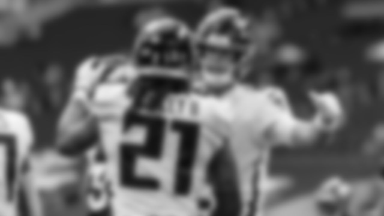 Atlanta Falcons quarterback Matt Ryan #2 and running back Todd Gurley #21 celebrate after Todd Gurley scores a touchdown against the Denver Broncos on November 8, 2020. (Photo by Rob Foldy/Atlanta Falcons)