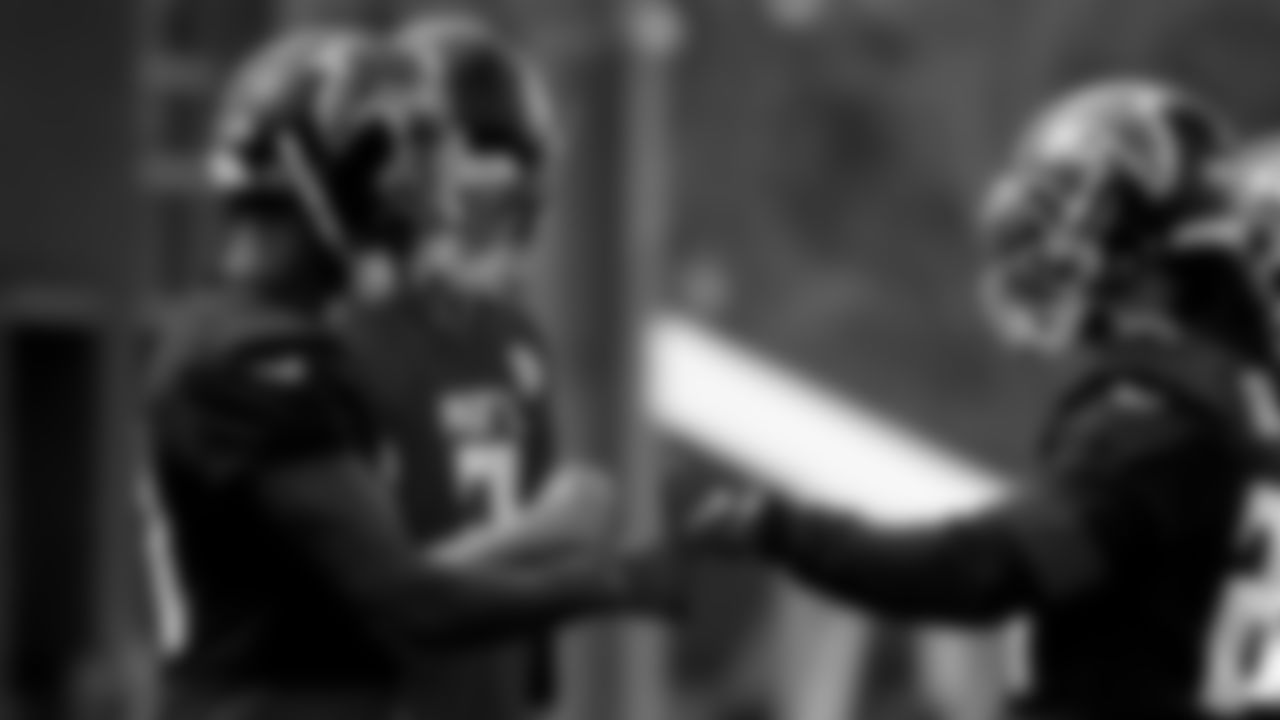 Atlanta Falcons quarterback Matt Ryan #2 and wide receiver Julio Jones #11 fist bump running back Todd Gurley #21 during practice at IBM Performance Field. (Photo by Kara Durrette/Atlanta Falcons)