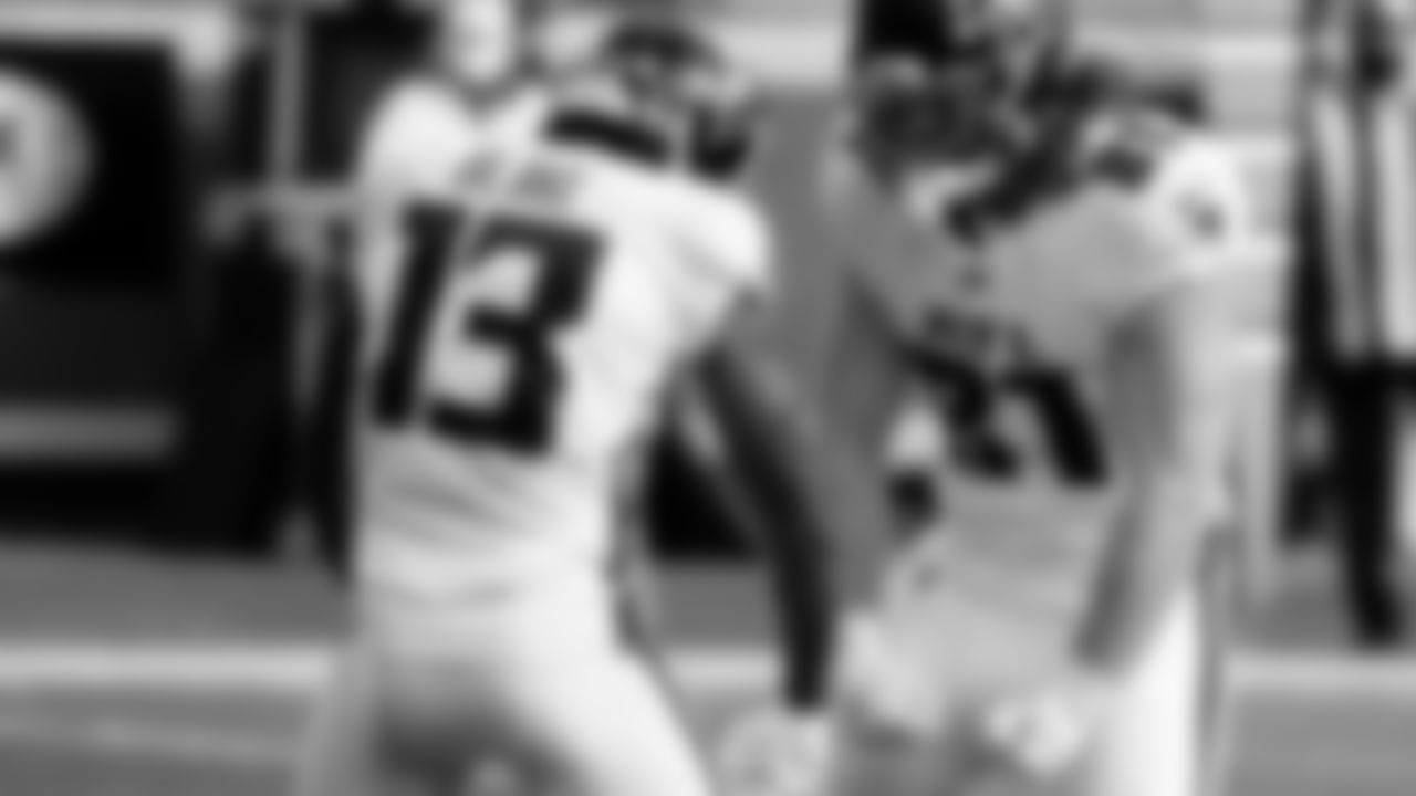 Atlanta Falcons tight end Hayden Hurst #81 celebrates scoring a touchdown with wide receiver Christian Blake #13 during the first half against the Kansas City Chiefs on December 27, 2020.