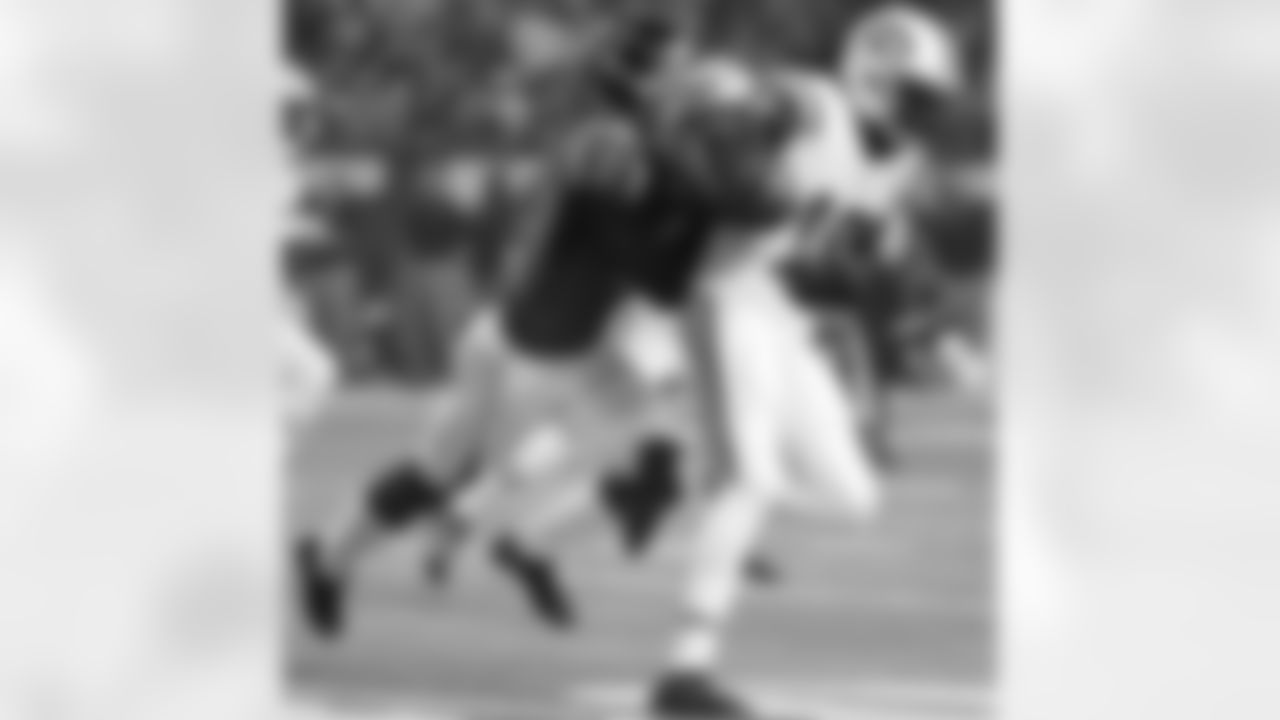 P Matt Bosher lunges forward to tackle Jets WR Clyde Gates