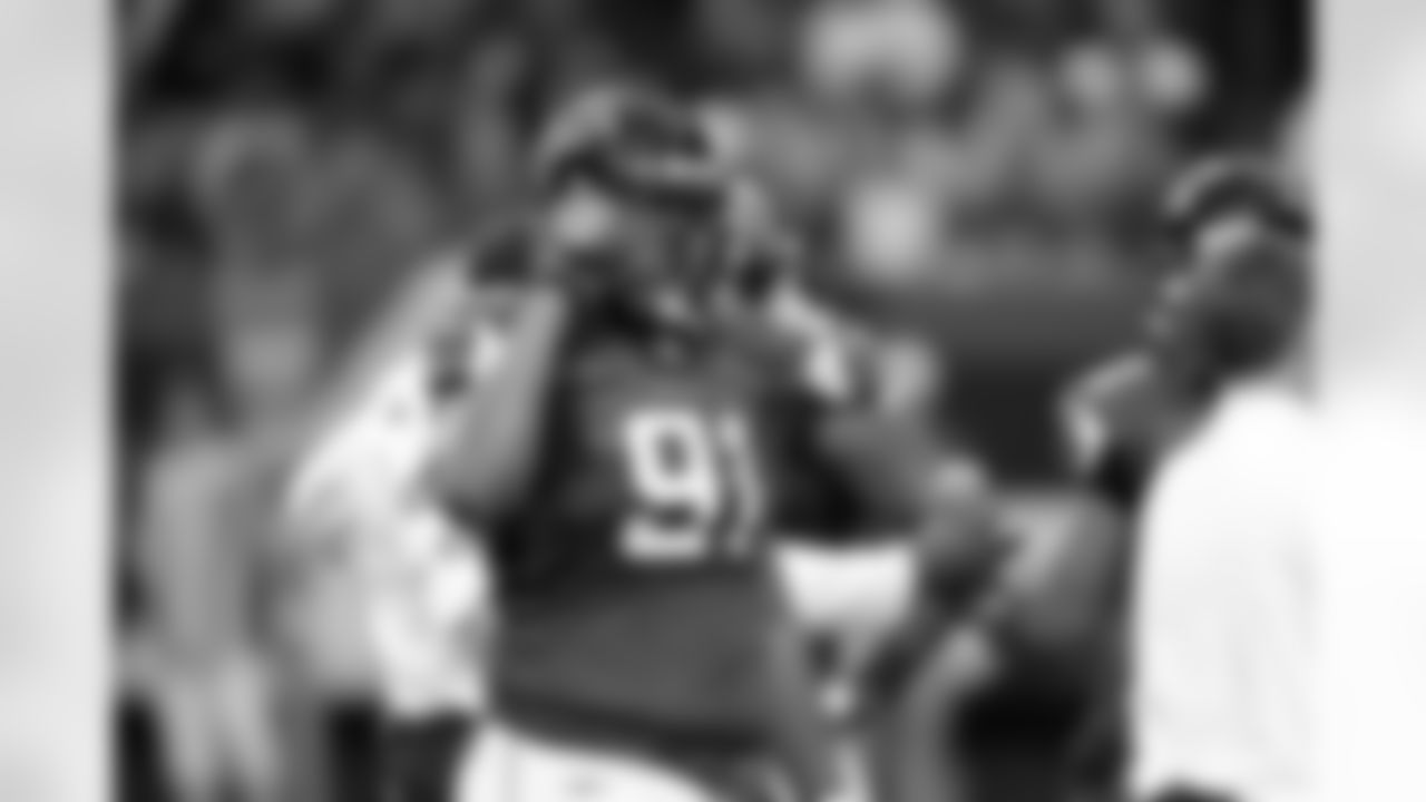 DT Corey Peters takes a minute to hydrate during the third quarter // Falcons vs Buccaneers // 11/7/10 - Georgia Dome