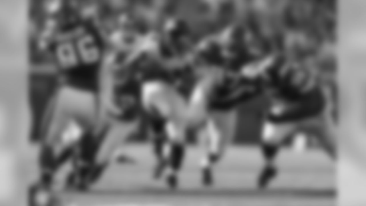 RB Devonta Freeman breaks tackles for a run.