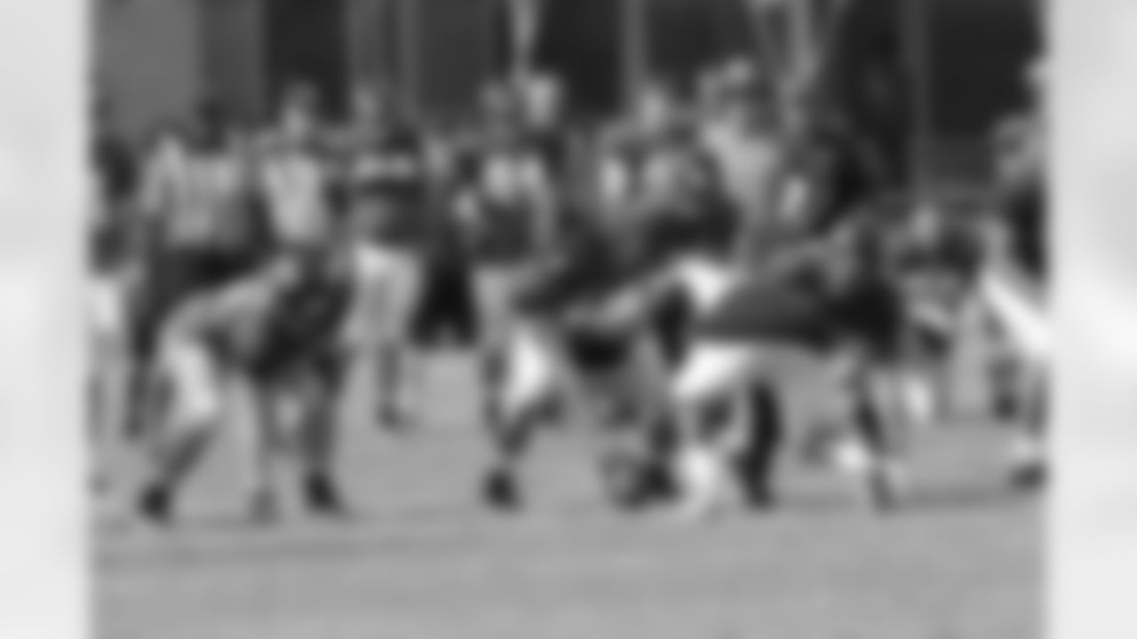 C Joe Hawley makes line calls before a play // 2011 Russell Athletic Training Camp - Day 8 // August 8, 2011 // Flowery Branch, Ga. —