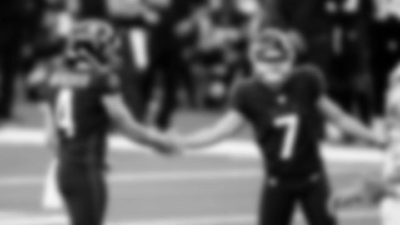 Atlanta Falcons punter Sterling Hofrichter #4 slaps hands with place kicker Younghoe Koo #7 in the second half against the Dallas Cowboys on September 20, 2020. (Photo by Kyle Hess/Atlanta Falcons)