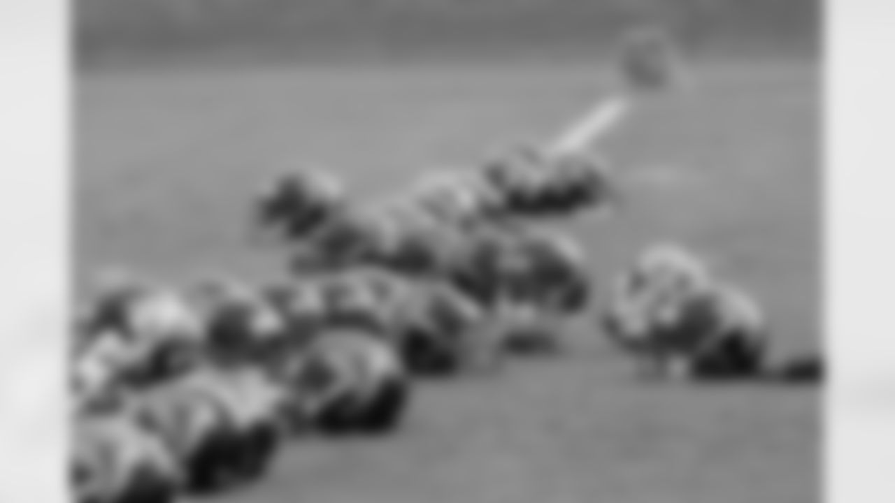 Helmets line the field // 2011 Russell Athletic Training Camp - Day 2 // July 30, 2011 // Flowery Branch, Ga. —
