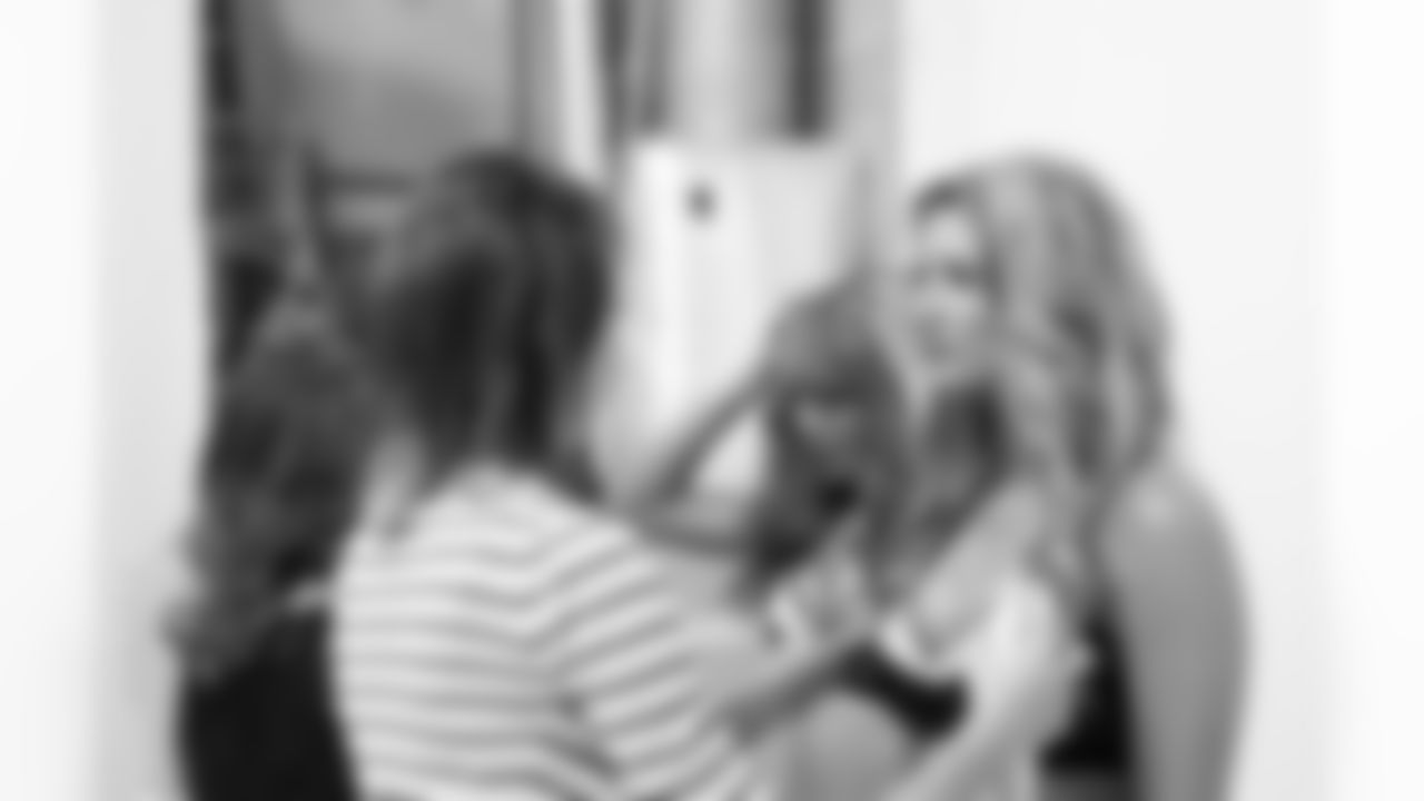 Naiz B. gets some final touch-up // 2011 Atlanta Falcons Cheerleaders Photo Shoot - Behind the Scenes // 5/22/11 // Atlanta, Ga. —