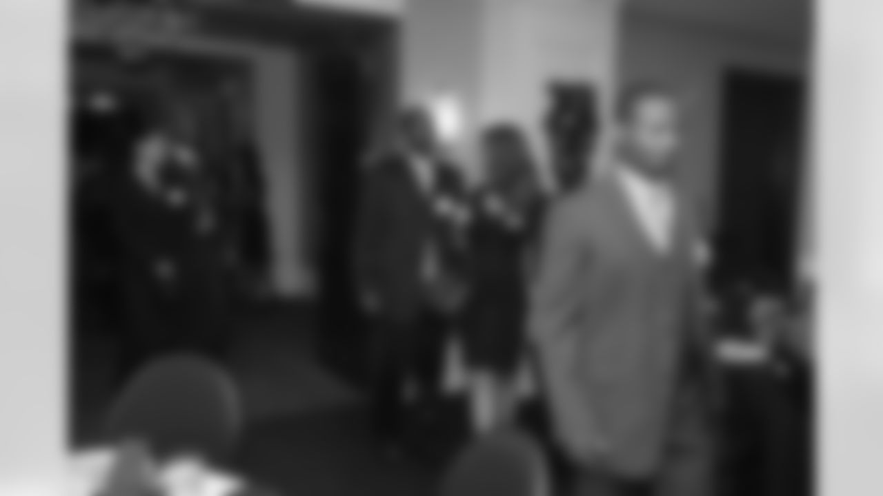The 2010 Falcons Walter Payton Man of the Year, Chris Owens, and 2011 nominee Harry Douglas make their way in // 2011 Falcons Community Honors Dinner // Dec. 5, 2011 // Atlanta -