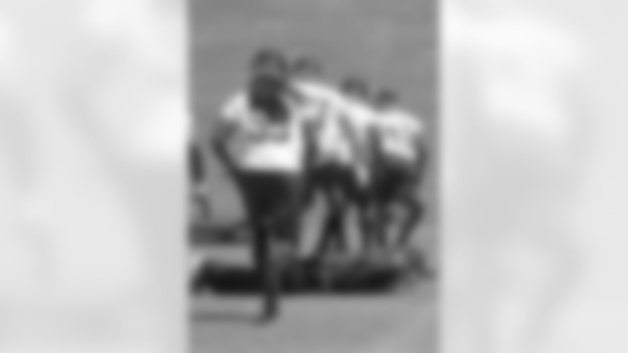 Linebackers coach Jeff Ulbrich replaced a pad with his body and made his position group run drills over him to make sure they understood not to step on the bags