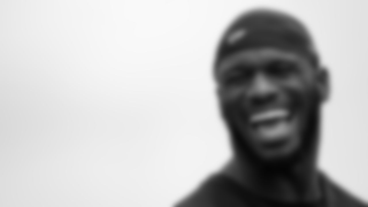 Atlanta Falcons linebacker Deion Jones #45 smiles and laughs during organized team activities in Phase III of the Atlanta Falcons offseason program on May 27, 2021.