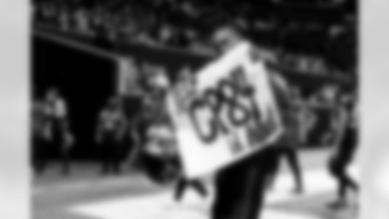 Atlanta Falcons running back Cordarrelle Patterson #84 holds up a sign after the game against the New Orleans Saints at Mercedes-Benz Stadium in Atlanta, Georgia on Sunday, January 9, 2022. (Photo by Matthew Grimes/Atlanta Falcons)